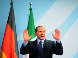 Silvio Berlusconi calificó como 'basura mediática' la amplia cobertura de la prensa. AFP  /