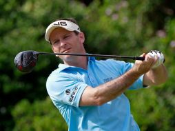 El viento y lo mojado de los greenes no impidieron que Mark Wilson resultara el ganador del torneo. AFP  /