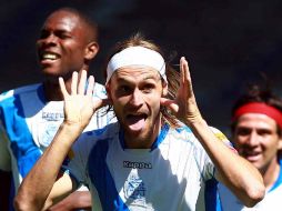 Gerardo Lugo festeja la primera anotación de los camoteros. MEXSPORT  /