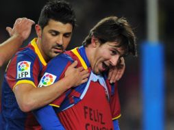 Messi mostró la felicitación a su madre, tras anotar un gol al Racing de Santander, el sábado pasado. EFE  /