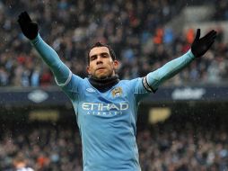 El jugador argentino en un partido con su equipo el Manchester City. AP  /