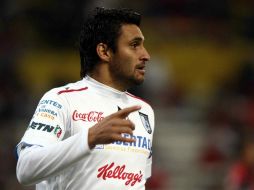 El jugador de Gallos Blancos del Querétaro en un partido del torneo Clausura 2011. MEXSPORT  /