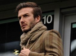 David Beckham observando un partido del Tottenham de la Liga Premier. AP  /