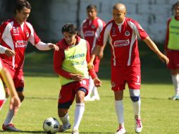Báez (centro), Christian Pérez y Adolfo Bautista durante la práctica. MEXSPORT  /
