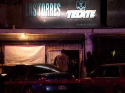 La policía local acude al lugar de los hechos, el bar 'Las Torres'. AFP  /