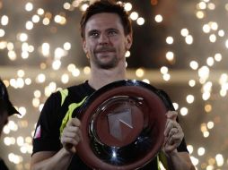 El tenista sueco Robin Soderling celebra ganar el torneo de tenis de Rotterdam. AP  /