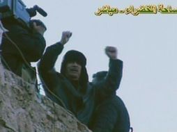 El líder libio Muamar Gadhafi se dirigió a simpatizantes reunidos en Trípoli, la capital libia. AFP  /