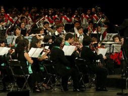 Los músicos forman parte de un program que busca involucrar a menores de escasos recursos en orquestas. E. BARRERA  /