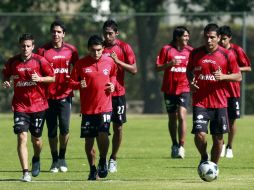Los jugadores titulares del Atlas trabajaron ligero, ayer en Colomos. MEXSPORT  /