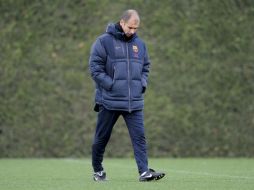 Josep Guardiola en la práctica de ayer del Barcelona. AFP  /