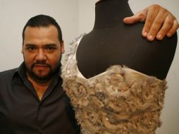 El diseñador mexicano Benito Santos  diseño el vestido rojo que utilizó Ximena Navarrete en la final de Miss Universo. M. FREYRÍA  /