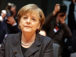 Merkel aseguró, que los países de la divisa común avanzan ''por el buen camino'' para superar los problemas del pasado. ARCHIVO  /