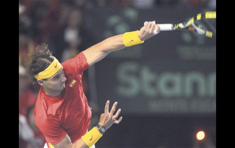 Nadal apabulló en tres sets al belga Ruben Bemelmans y ganó el punto dos para España. EFE  /