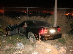 El policía quedó sentado en asiento del copiloto y se le apreciaban cuatro balazos en el tórax. O. RUVALCABA  /