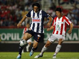 Aldo de Nigris (izq.) fue el autor del gol de la victoria del Monterrey. MEXSPORT  /