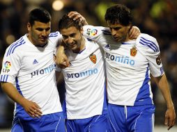 El capitán Gabriel Fernandez (centro) anotó dos goles para el conjunto maño. REUTERS  /