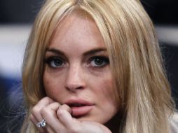 Lohan tomó la decisión hace una semana y ahora trabaja con un entrenador cada mañana. AP  /