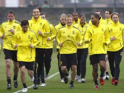 Jugadores del Liverpool entrenan previo al encuentro con el Braga. AP  /