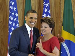 Barack Obama, presidente de Estados Unidos, saluda a Dilma Rousseff, mandataria de Brasil. REUTERS  /