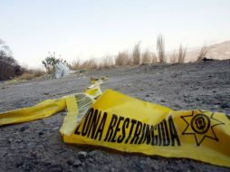 Uno de los crímenes ocurridos en Zapopan, se registró a la altura del kilómetro 17 de la carretera a Saltillo. A. GARCÍA  /