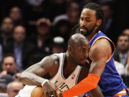Kevin Garnett se convirtió en el factor clave en el triunfo de ayer de los Celtics, al encestar 24 puntos y bajar 11 rebotes. AP  /