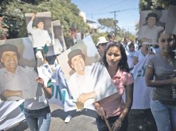 Decenas de nicaragüenses marcharon por las calles de Managua para apoyar a Muamar Gadhafi. AP  /