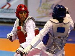 El taekwondoín tapatío Uriel Adriano (de rojo) obtuvo el segundo triunfo internacional de este año. MEXSPORT  /