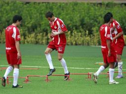 Los jugadores de Chivas durante una sesión de entrenamiento. MEXSPORT  /