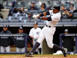 Curtis Granderson al momento de conectar el cuadrangular que le dio rumbo al partido. AP  /