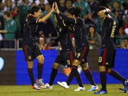 Los jugadores de la Selección mexicana celebrando un gol en su más reciente partido. MEXSPORT  /