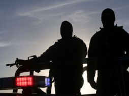 No hubo policías heridos, sólo se afectó a vehículos de la corporación. ARCHIVO  /