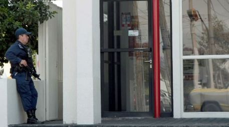 El secretario de la SSPE descarta que los elementos puedan ser enviados a reforzar la seguridad en los bancos. ARCHIVO  /