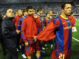 Los jugadores del Barcelona al termino del partido contra Real Madrid en la final de la Copa Rey. AFP  /