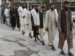 Las autoridades tienen datos biométricos de cada prisionero para ayudar a su identificación. REUTERS  /