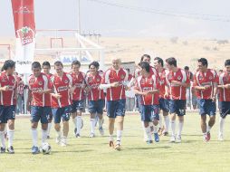 Los jugadores de Chivas cambiaron Verde Valle por el recién inaugurado ''Chivabarrio'', en Tlajomulco de Zúñiga. S. NÚÑEZ  /