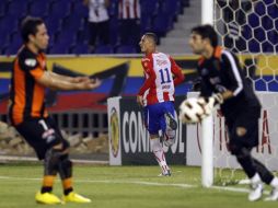 Jorge Villalpando se molestó porque fue sacado de su portería en el duelo ante Junior de Barranquilla. AP  /