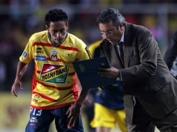 Manuel Pérez  y Tomás Boy entrenador de Monarcas, durante juego de los cuartos de final del Clausura 2011. MEXSPORT  /