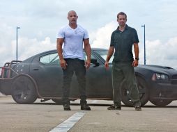 En la cinta el ex policía Brian O’Conner (Paul Walker) se asocia con el prófugo Dom Toretto (Vin Diesel) para resolver un caso. AP  /