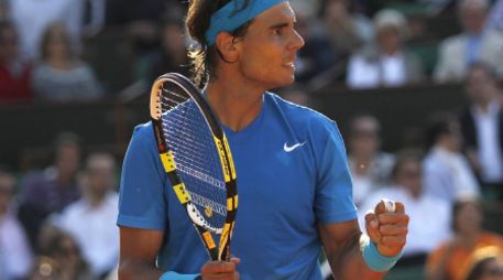 El tenista español, Rafael Nadal, celebra un punto ante el sueco Robin Soderlin.EFE  /