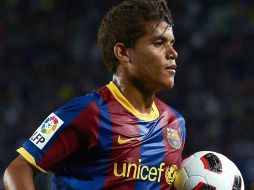 Jonathan dos Santos durante un partido con el Barcelona B. MEXSPORT  /