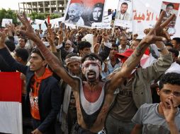 Manifestantes exigen la conformación  de un consejo para reemplazar a Saleh. AFP  /