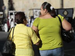 Expertos creen que ciertas toxinas son las responsables del aumento de peso. ARCHIVO  /