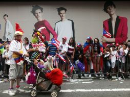 La comunidad puertorriqueña celebra por las calles de Nueva York. AFP  /