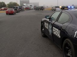 Agentes federales dispararon al auto en que viajaban tras no hacer el alto. ARCHIVO  /