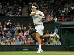 Roger Federer sigue dominando sus partidos en el All England Tenis Club. AFP  /