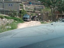 Uniformados estatales acudieron a la colonia zapopana Junta de los Ocotes, para indagar sobre cadáveres enterrados en finca. M. PATIÑO  /