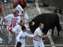 El quinto encierro en Pamplona, en lo que es el más famoso festival veraniego de España. AFP  /