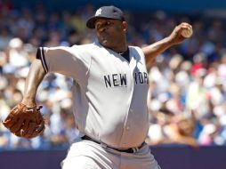C.C. Sabathia haciendo muestra de su talento durante el partido contra los Azulejos. AFP  /