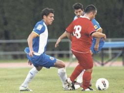 Héctor Moreno (izq.) entró en el segundo tiempo pero tuvo pocas oportunidades para mostrarse. ESPECIAL  /