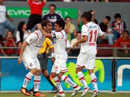 Los elementos del Toluca celebrán después de la primera anotación del partido. MEXSPORT  /